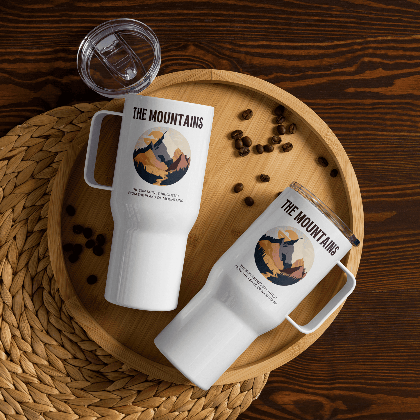 Travel mug with a handle 'The mountains. The sun shines brightest from the peaks of mountains'