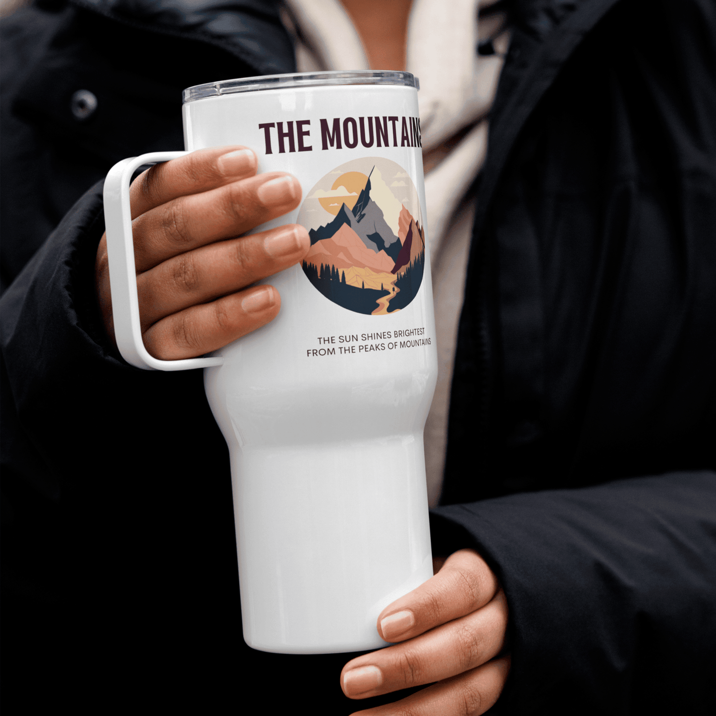 Travel mug with a handle 'The mountains. The sun shines brightest from the peaks of mountains'